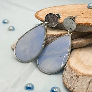 boucles en pate fimo et resine bleu ciel